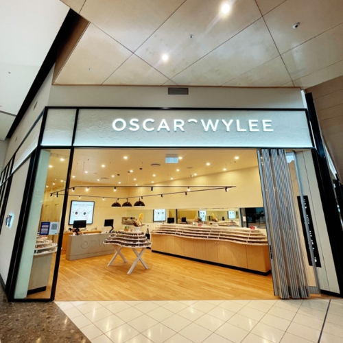 Storefront of Oscar Wylee eyewear shop in a shopping mall.